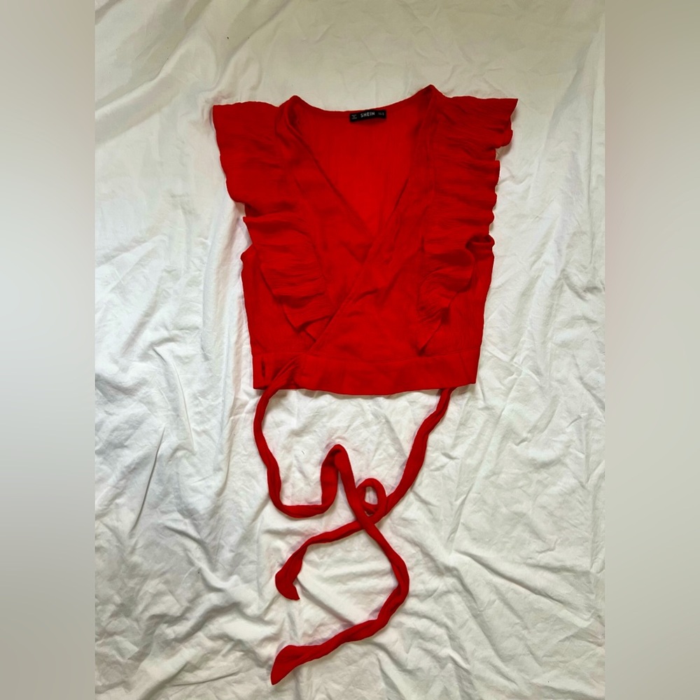 Red ruffle wrap shirt. Crop top never worn